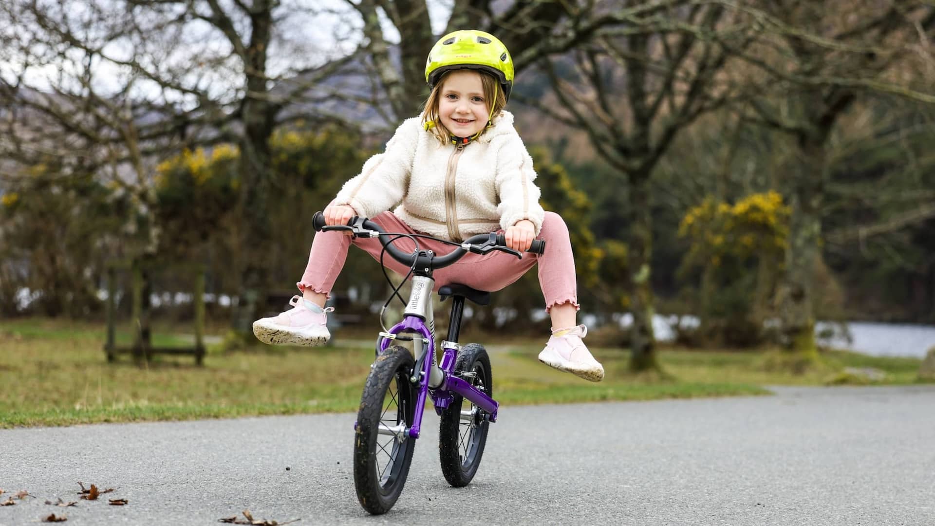 #colour_indigo go, Adventure starts here! | 4 year old girl with feet up in big balance bike mode