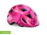 #colour_pink hearts,Pink Hearts Kids Helmet Side|MET Hooray kids helmet is light comfy and adjusts easily for a safe secure fit
