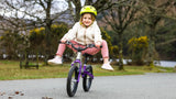 #colour_indigo go, Adventure starts here! | 4 year old girl with feet up in big balance bike mode