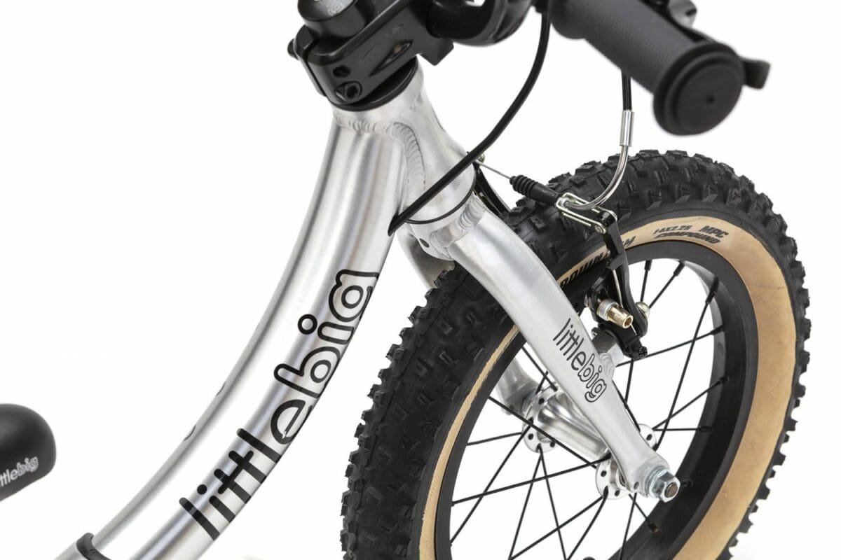 brushed balance bike fork and tyre detail